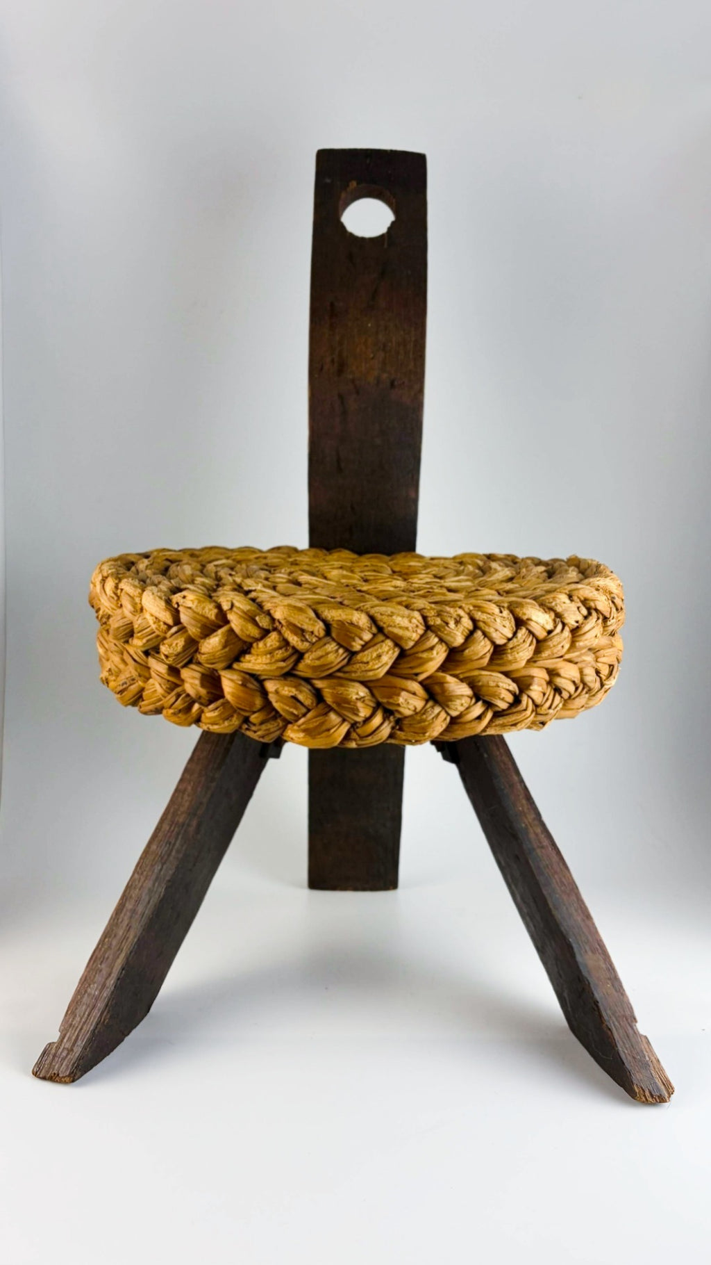Three-legged stool with woven seat by Audoux &amp; Minet