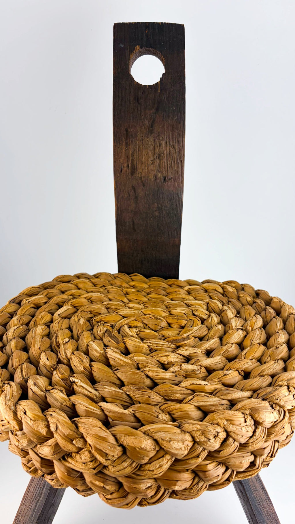 Three-legged stool with woven seat by Audoux &amp; Minet