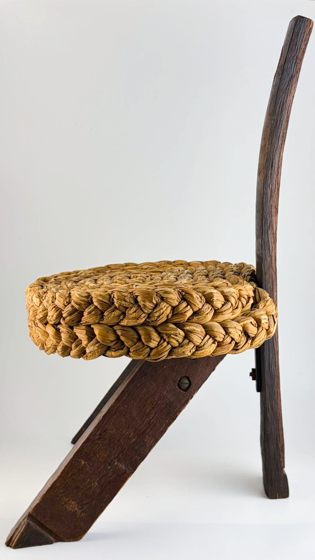 Three-legged stool with woven seat by Audoux &amp; Minet